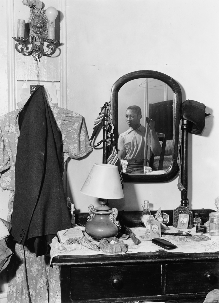 AARON SISKIND (1903-1991) Harlem (man reflected in a mirror) * Harlem (woman wearing a suit and corsage).